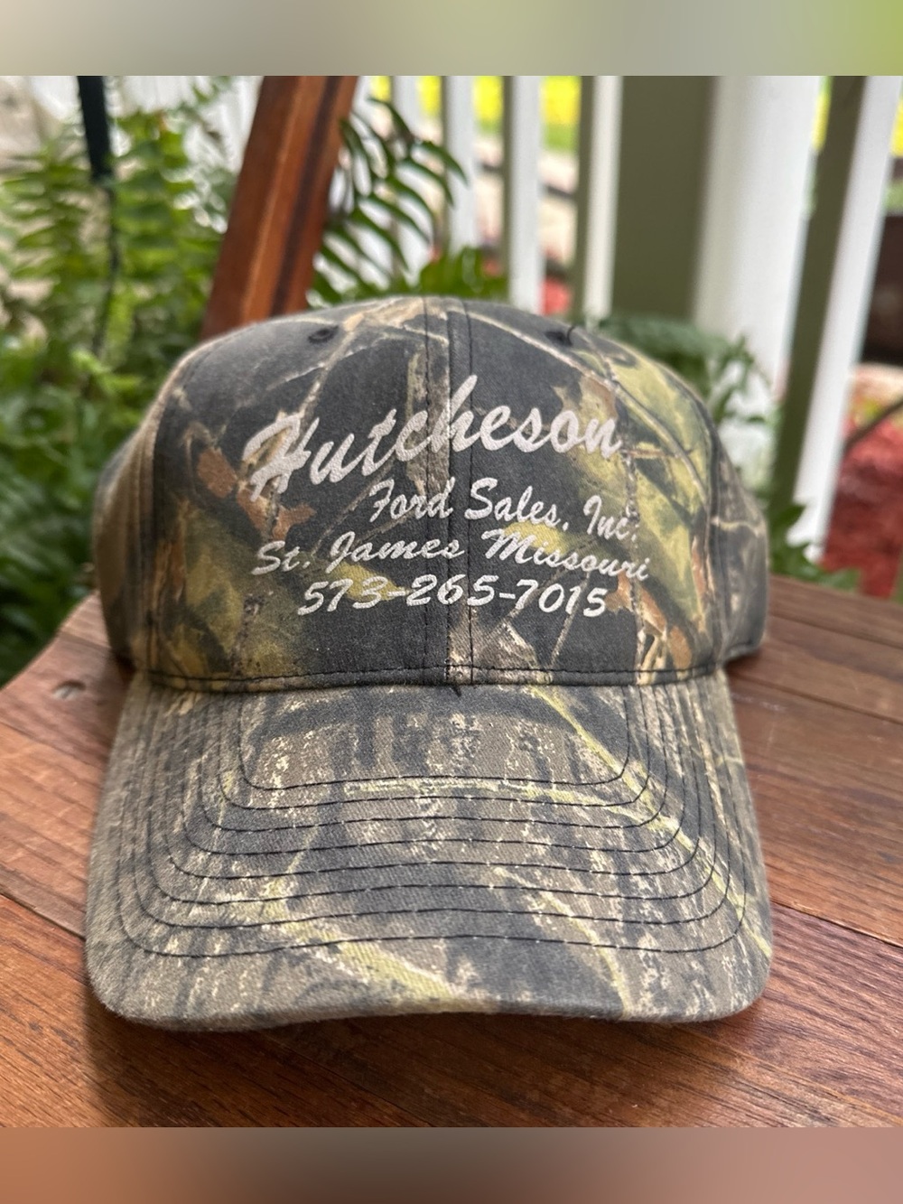 Realtree Camo Hat with White Script Hutcheson Logo